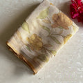 Light Beige Soft Tissue Linen Saree With Golden Yellow Accents