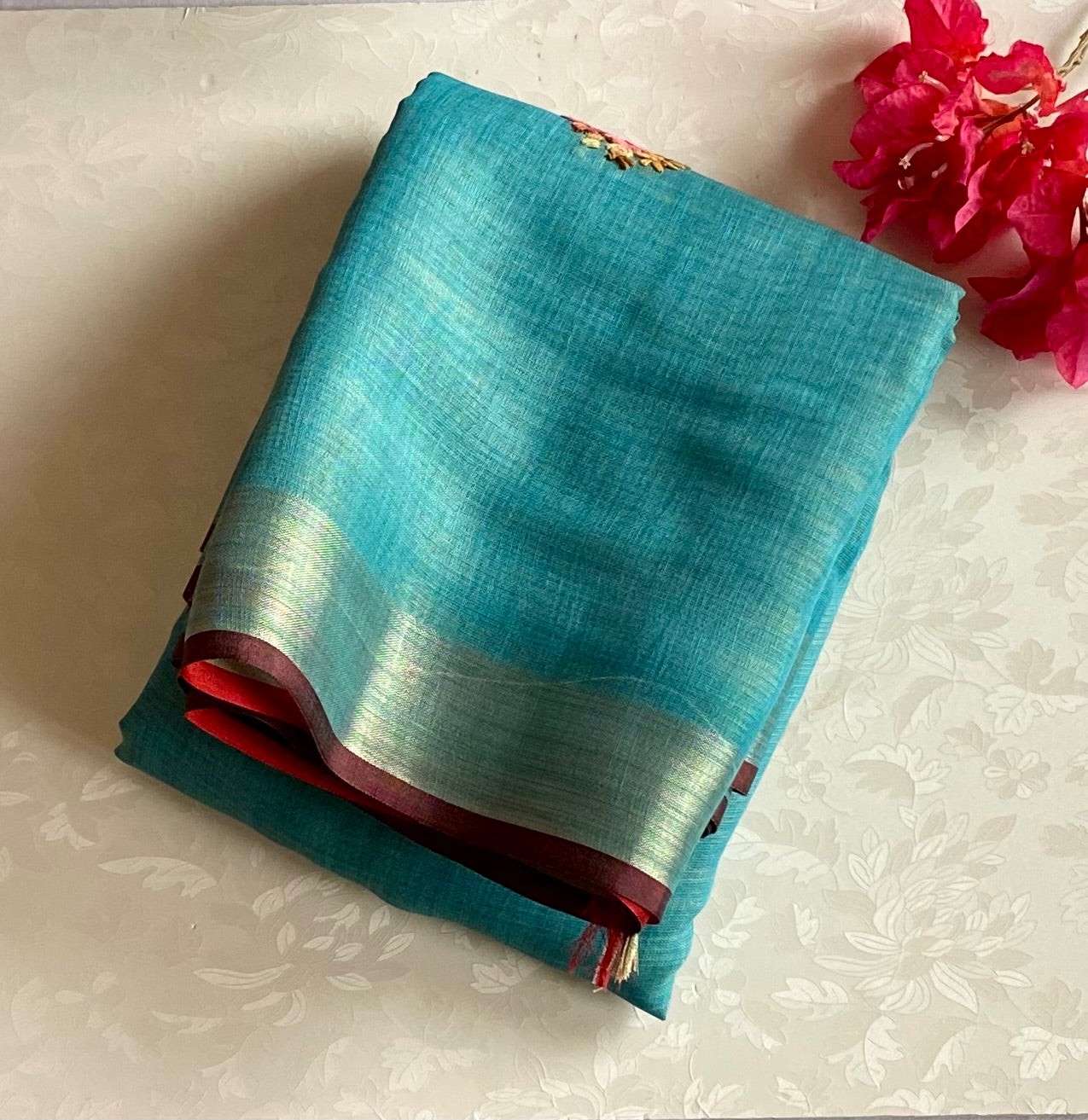 Teal French Knot Embroidered Soft Linen With Gold Zari Border & Hand Embroidered Pallu