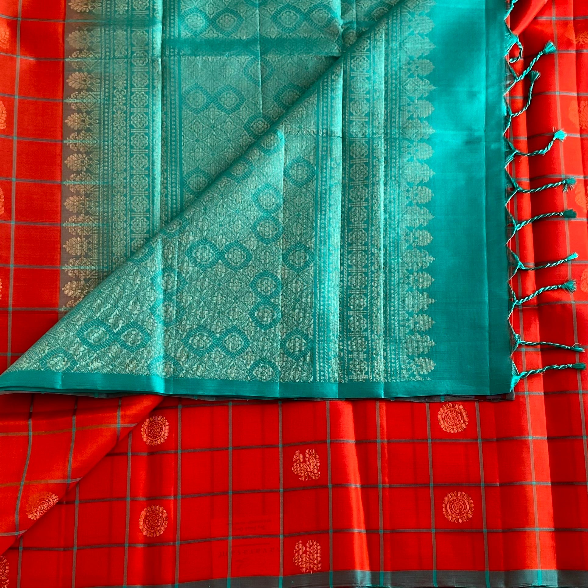 Vermilion Orange Designer Pure Silk Saree With Teal Pallu And Gold Zari