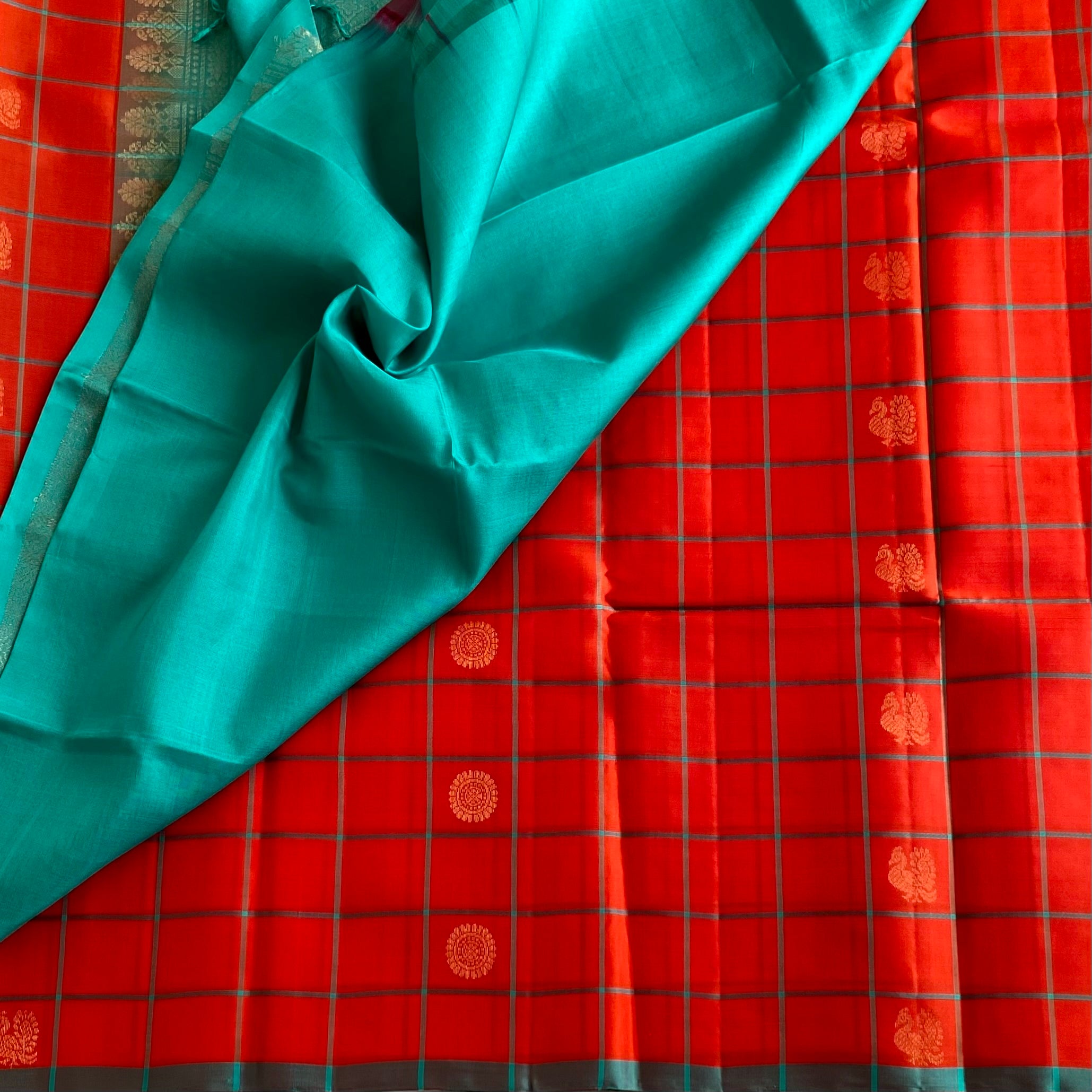 Vermilion Orange Designer Pure Silk Saree With Teal Pallu And Gold Zari