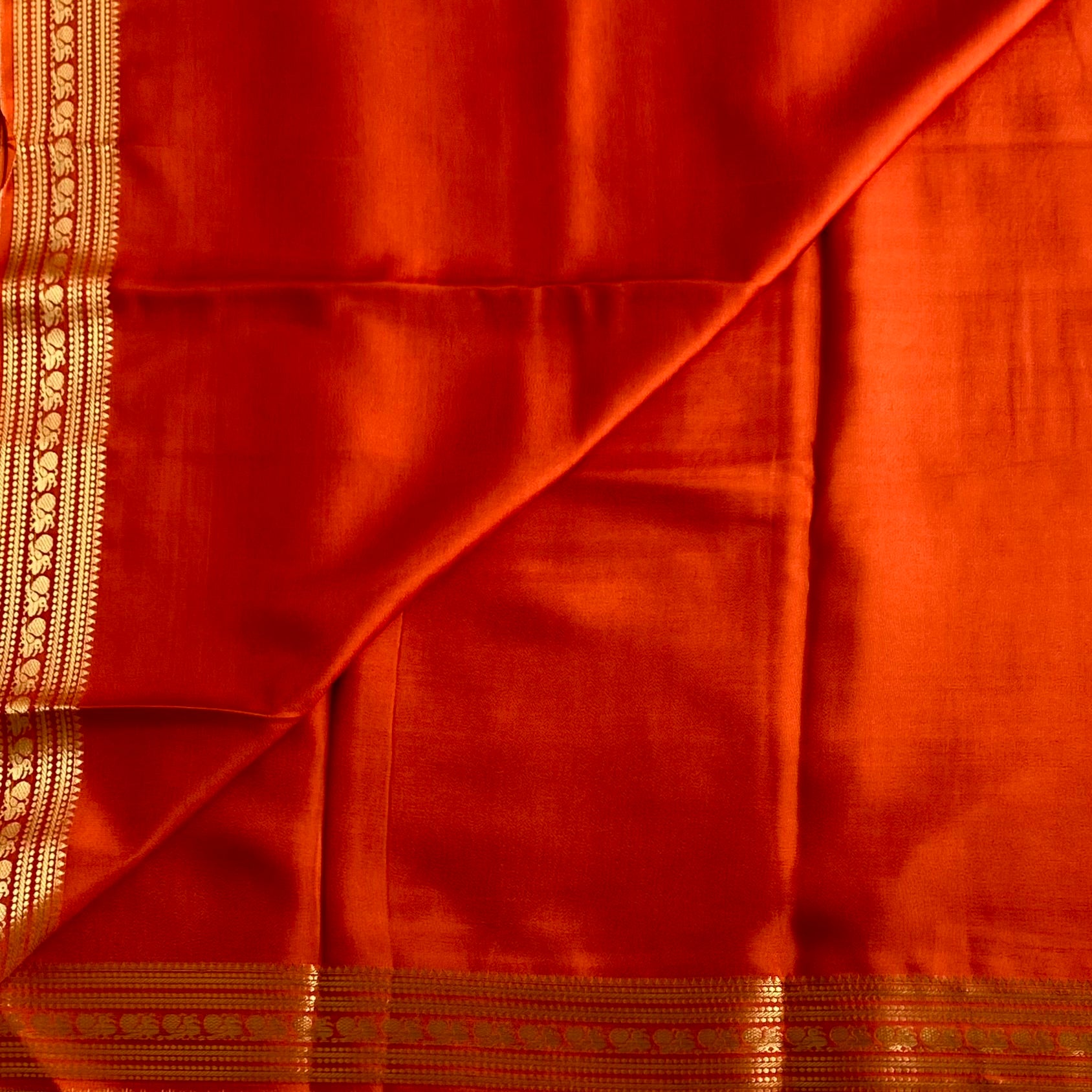 Burnt Orange Premium Soft Crepe Silk With Metallic Gold Pallu