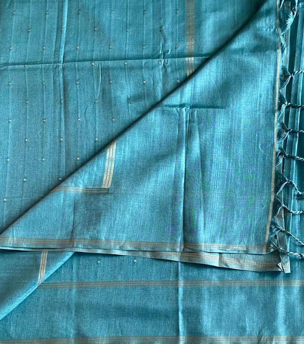 Elegant Powder Blue Soft Premium Tussar With Tiny Zari Woven Buttas