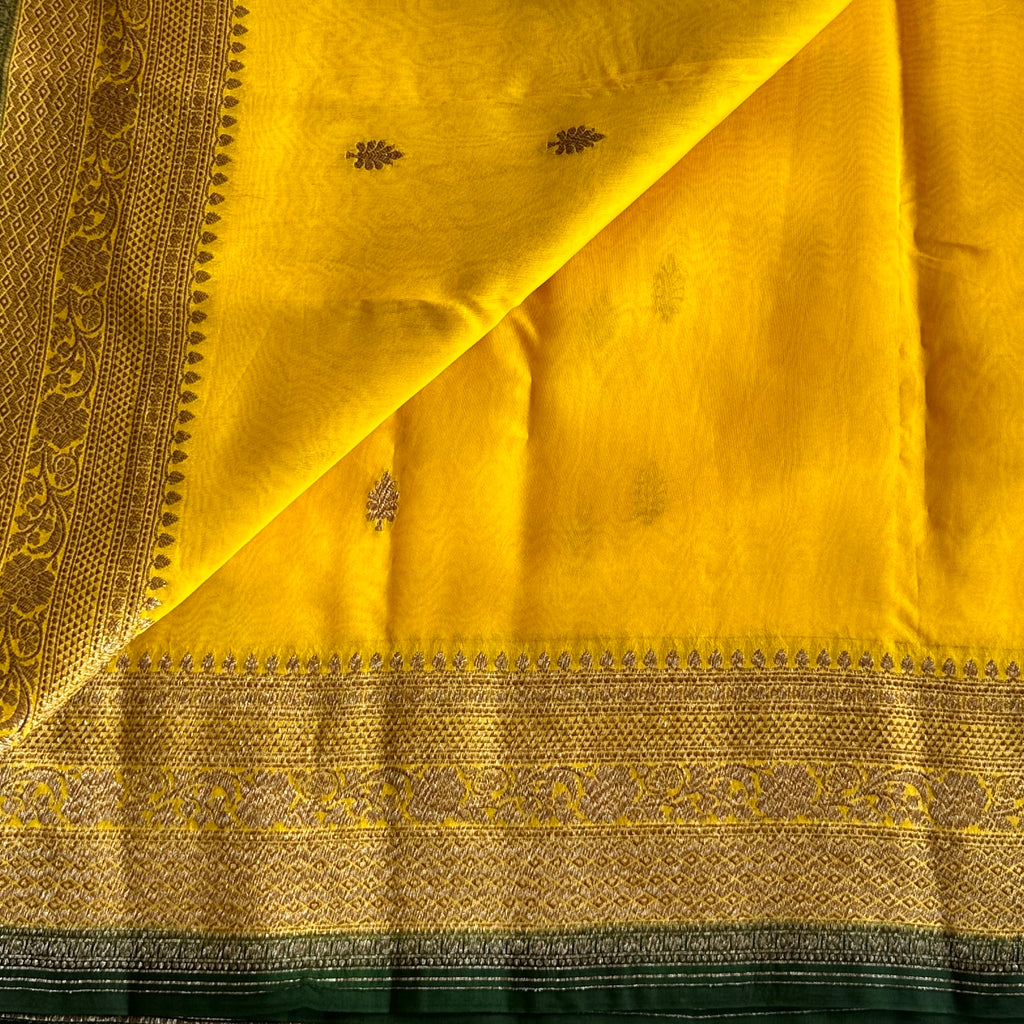 Golden Yellow Banarasi Organza Silk With Bottle Green Pallu & Antique Zari Weave