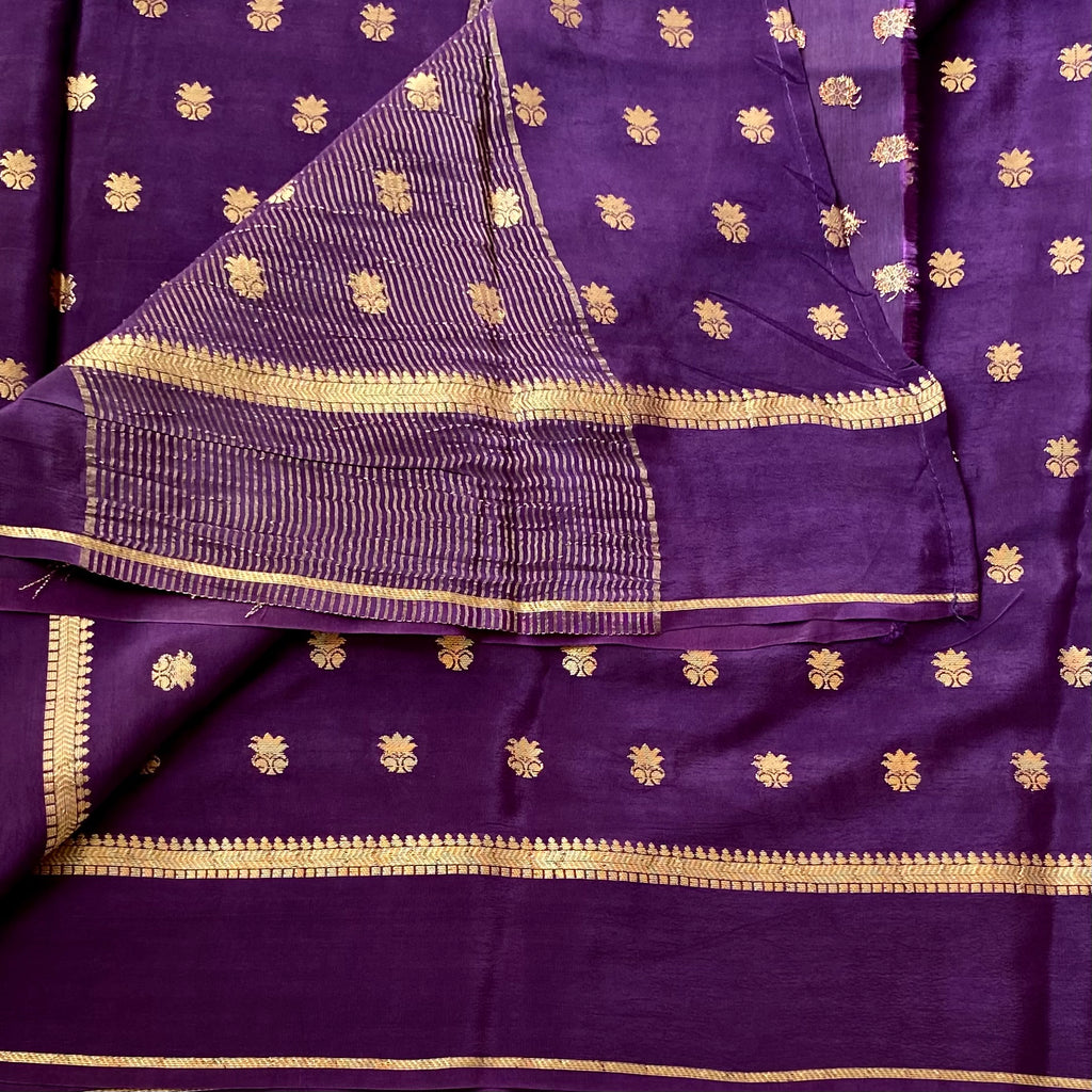 Brinjal Purple soft crepe stunner with gold zari woven buttas