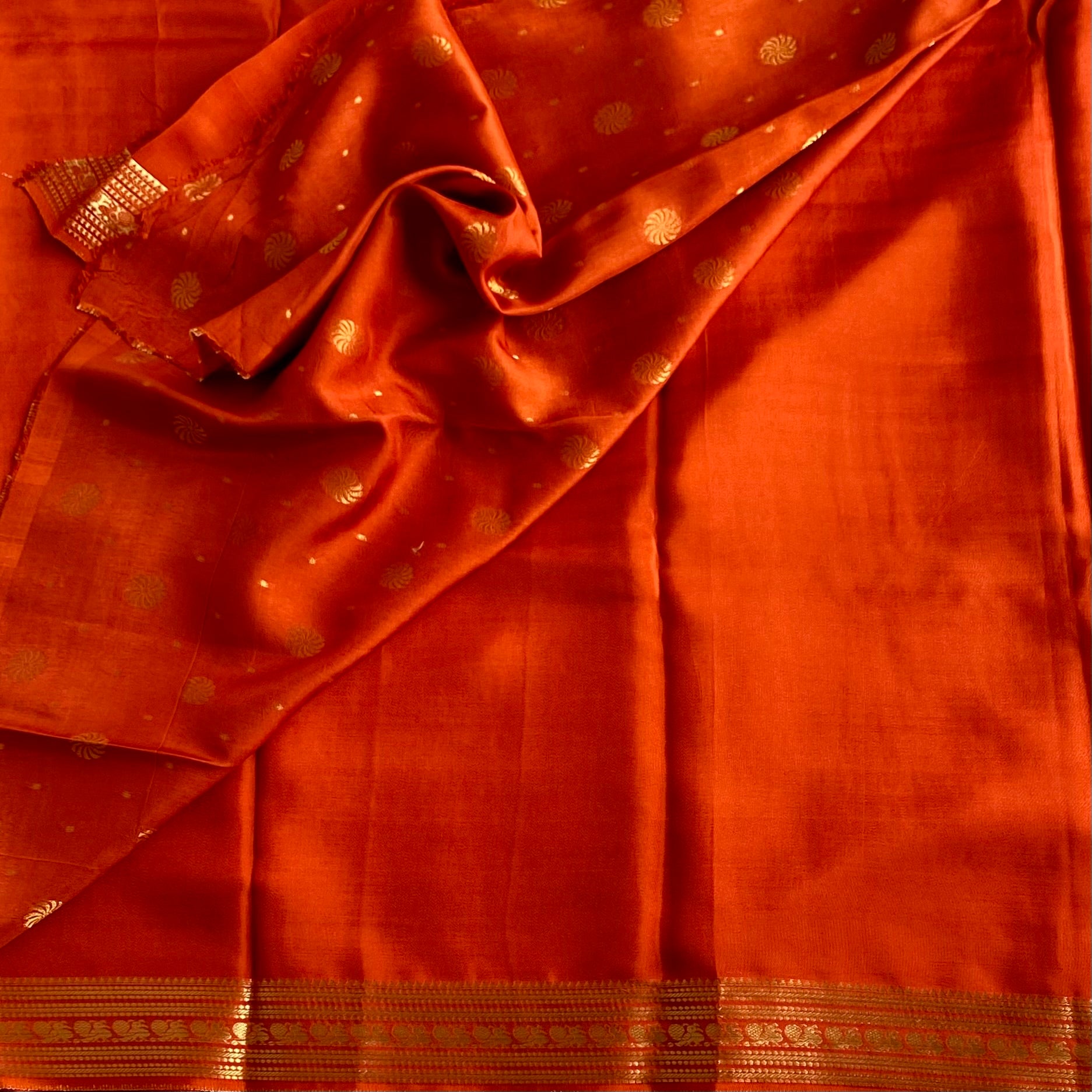 Burnt Orange Premium Soft Crepe Silk With Metallic Gold Pallu