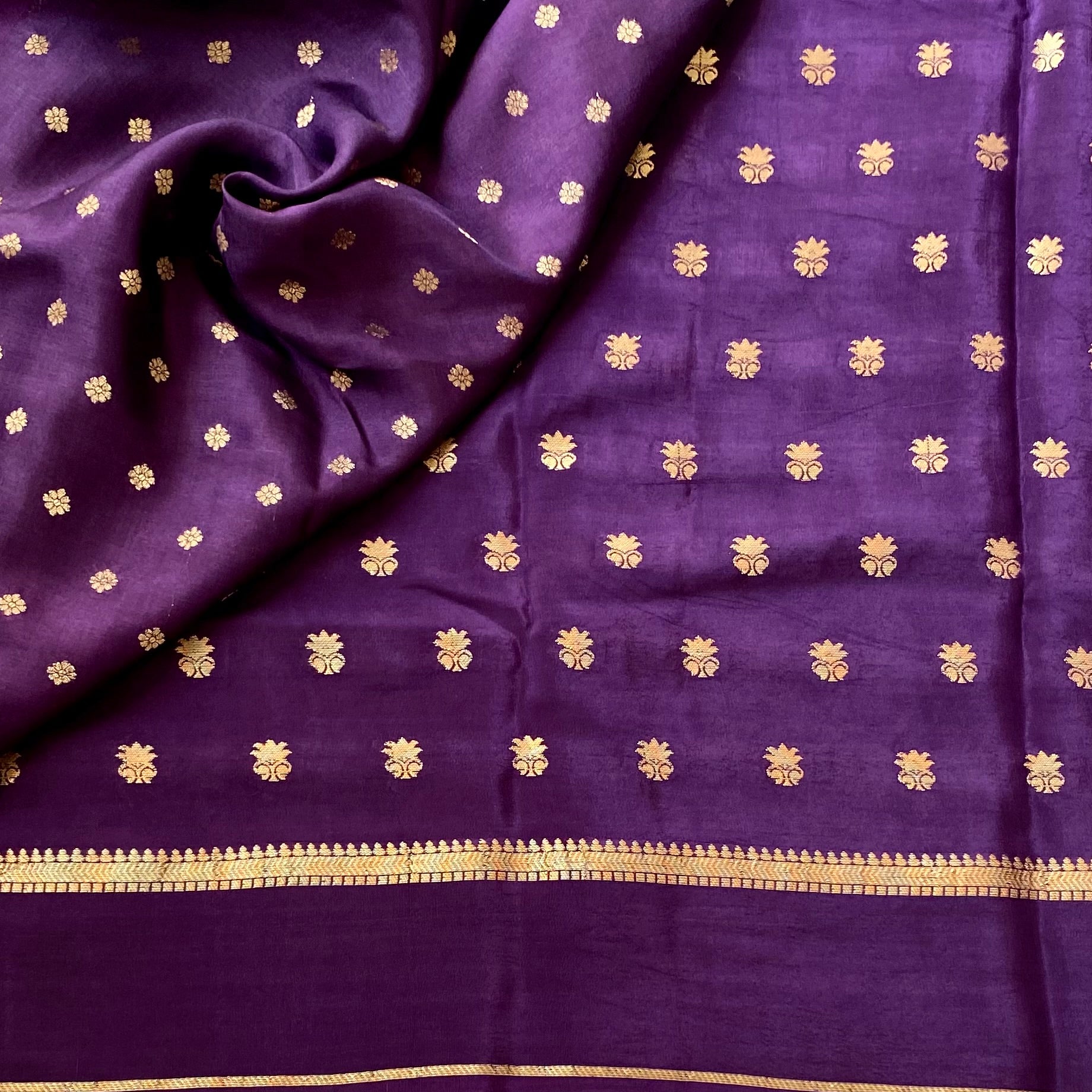 Brinjal Purple soft crepe stunner with gold zari woven buttas