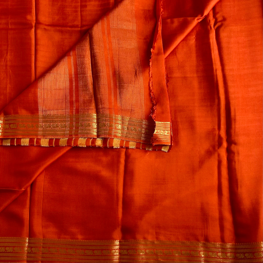Burnt Orange Premium Soft Crepe Silk With Metallic Gold Pallu