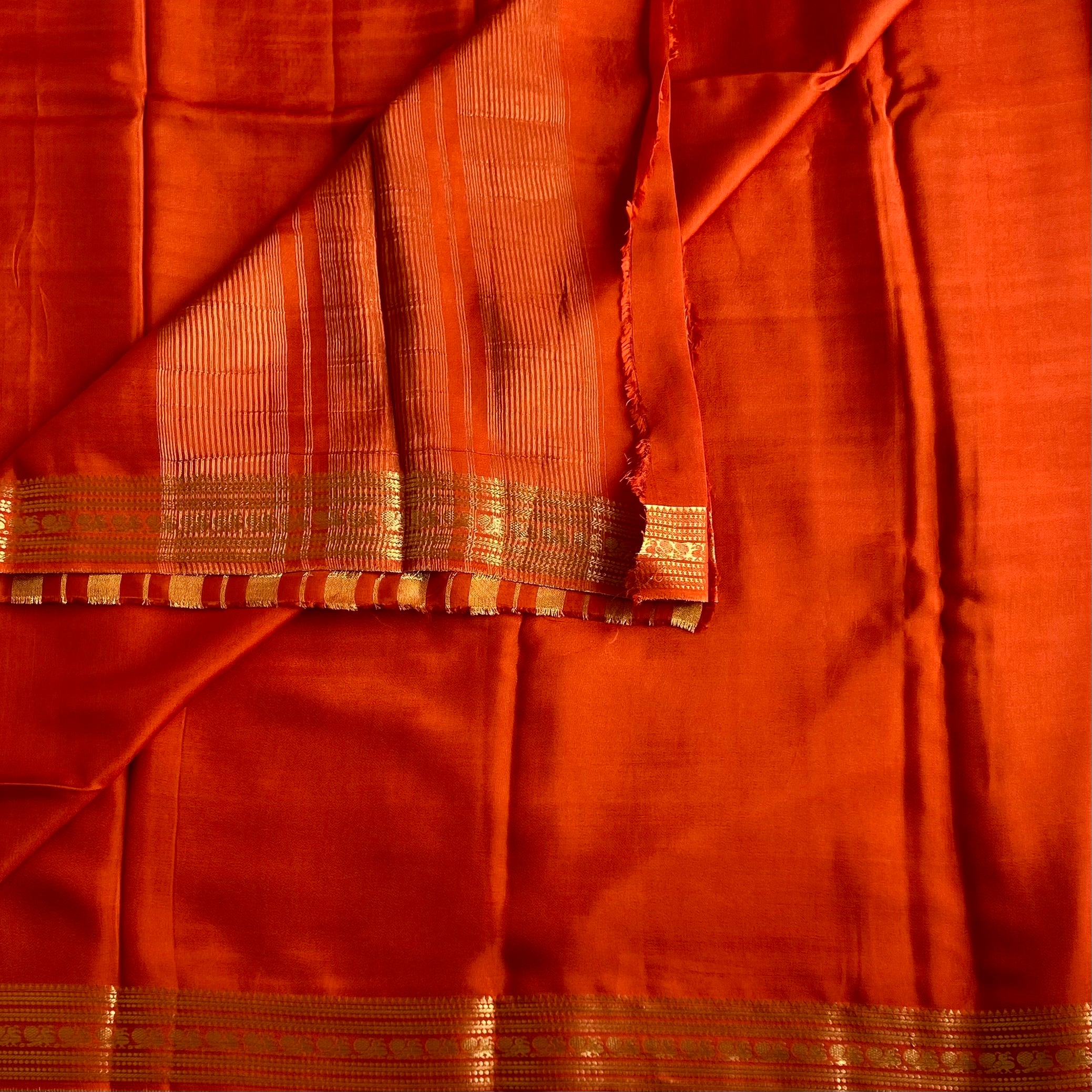 Burnt Orange Premium Soft Crepe Silk With Metallic Gold Pallu
