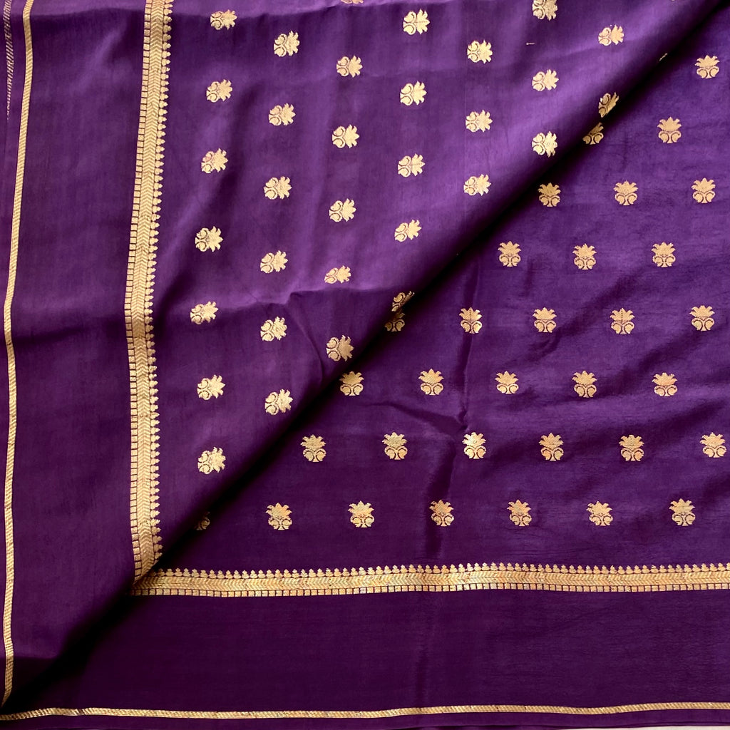 Brinjal Purple soft crepe stunner with gold zari woven buttas