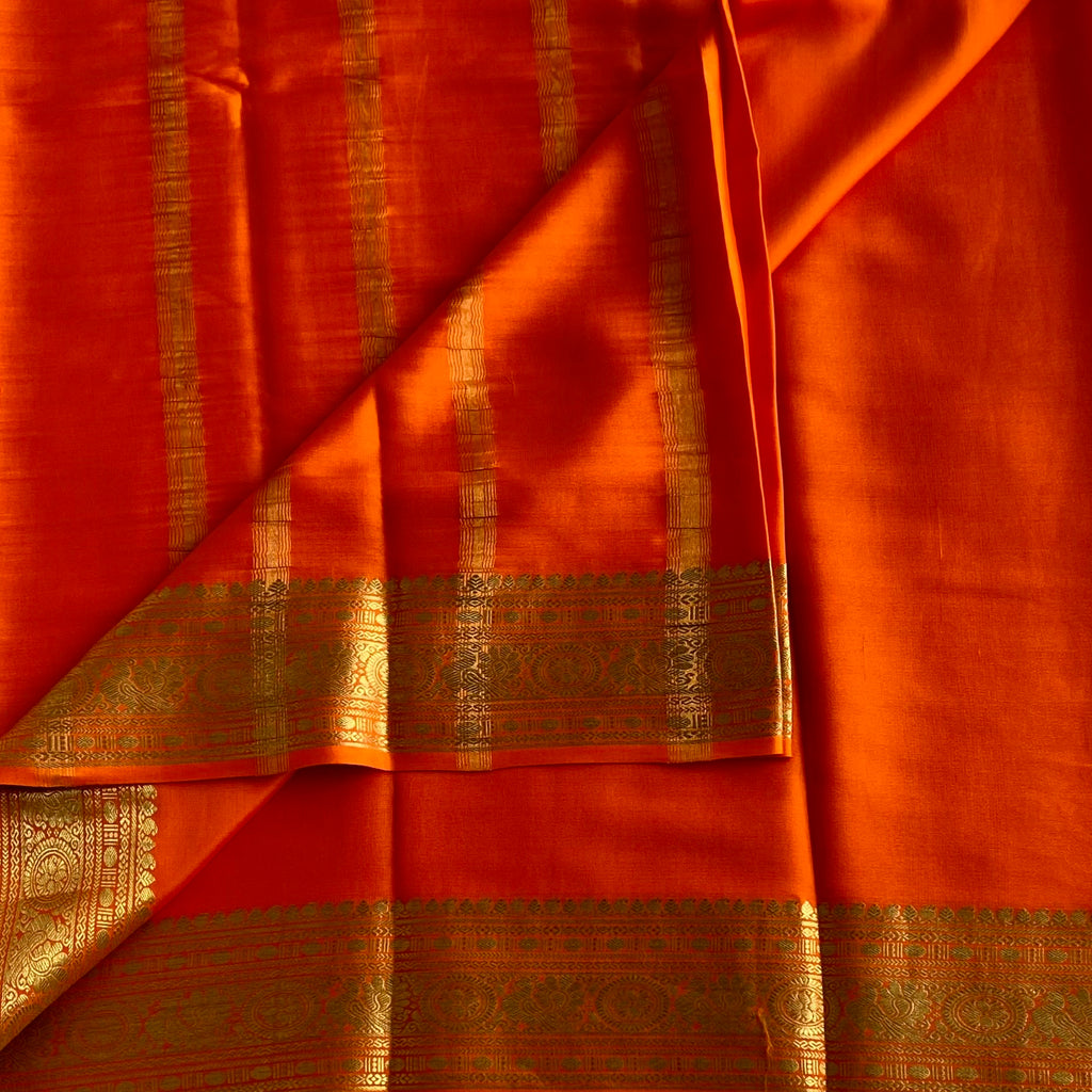Sunset Orange Mysore Crepe Silk Saree With Metallic Gold Border