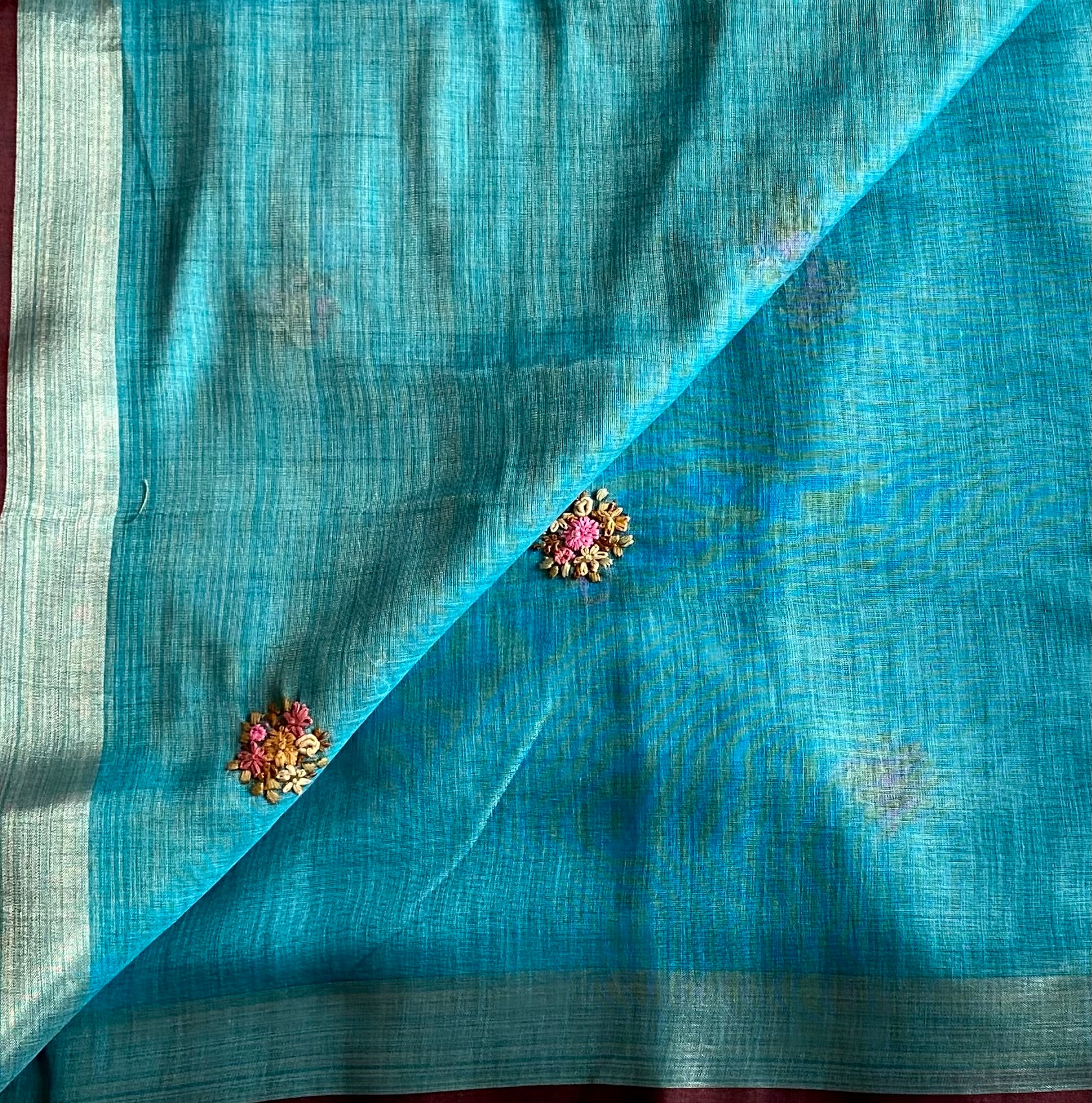Teal French Knot Embroidered Soft Linen With Gold Zari Border & Hand Embroidered Pallu
