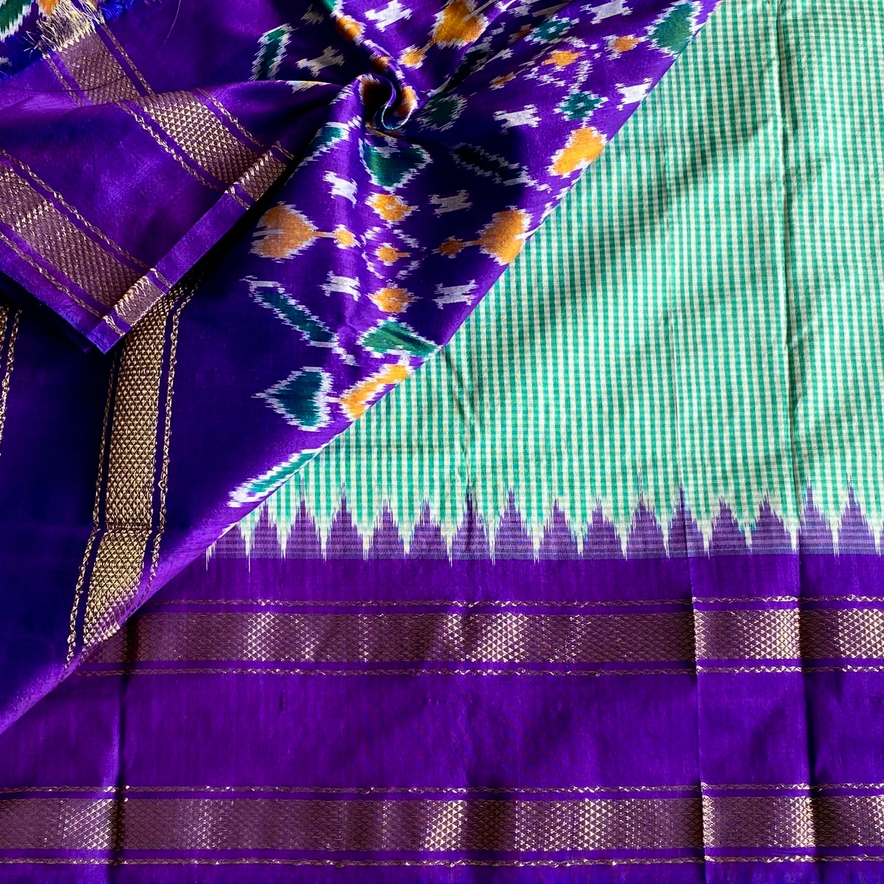 Micro Checkered Sea Green Pure Ikkat Handloom Silk With Ikkat Woven Pallu & Blouse