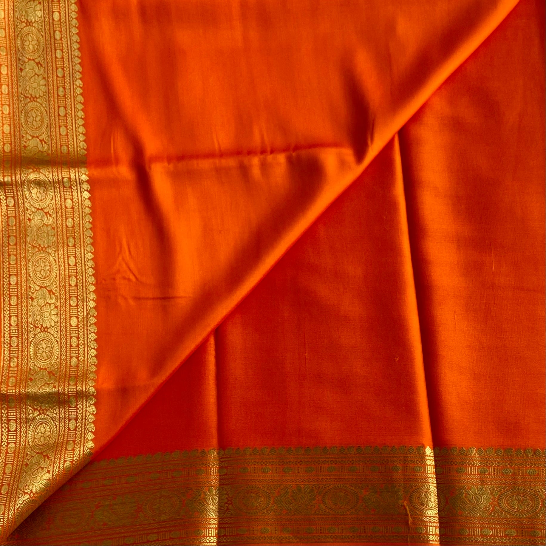 Sunset Orange Mysore Crepe Silk Saree With Metallic Gold Border