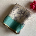 Beige Soft Tussar Silk Saree With pastel Teal Green Pallu And Gold Border
