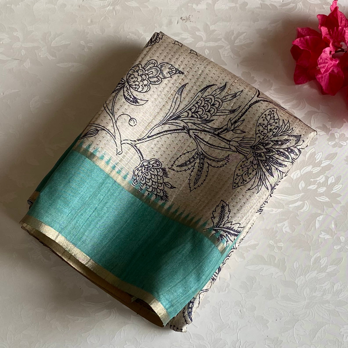 Beige Soft Tussar Silk Saree With pastel Teal Green Pallu And Gold Border
