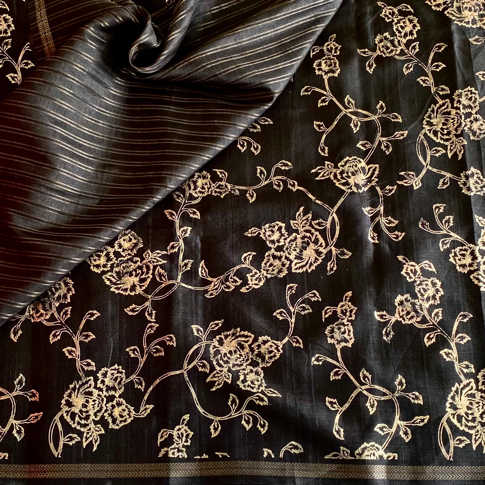 Jet Black Soft Tussar Silk Saree With Antique Gold Floral Pallu