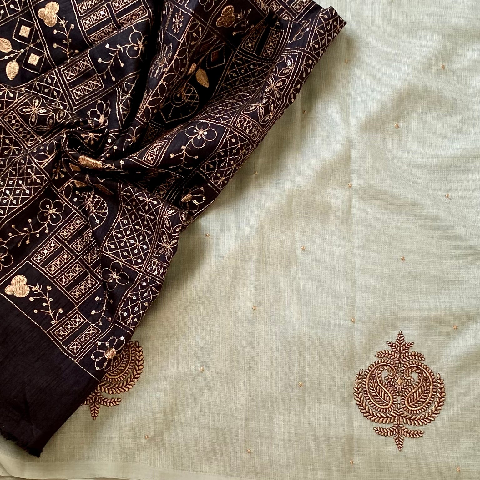 Sage Green Embroidered Saree with Copper Motifs and Tassels Elegant