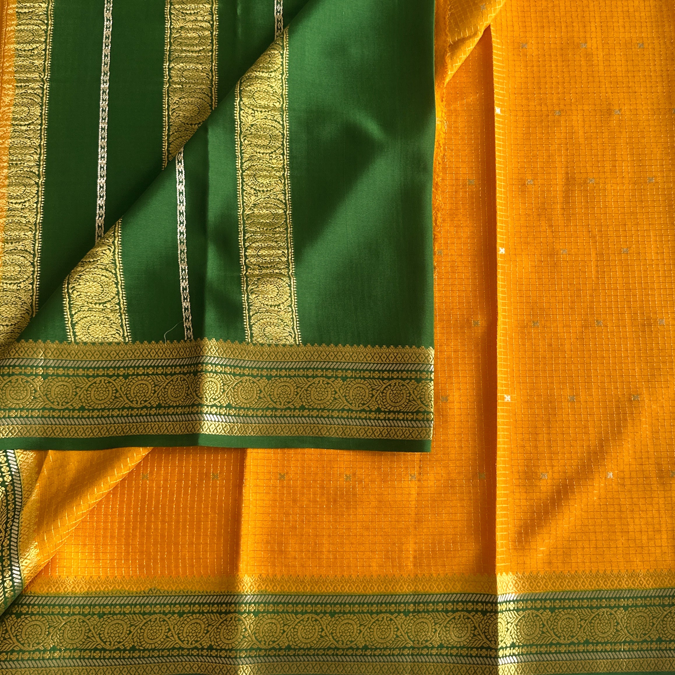 Mustard Yellow Saree With Gold Paisley Zari Border And Green Hem