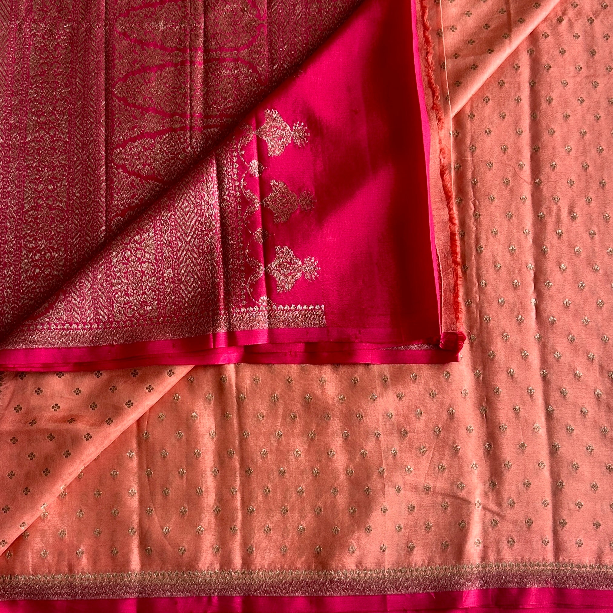 Peach Banarasi Crepe Silk Saree With Rani Pink Pallu