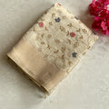 Cream Floral Embroidered Silk Saree with Gold Zari and Border