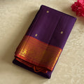 Elegant purple with dual shaded rust orange Kanjeevaram stunner