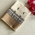 Ivory Handloom Cotton Saree with Tan Border and Folk Prints