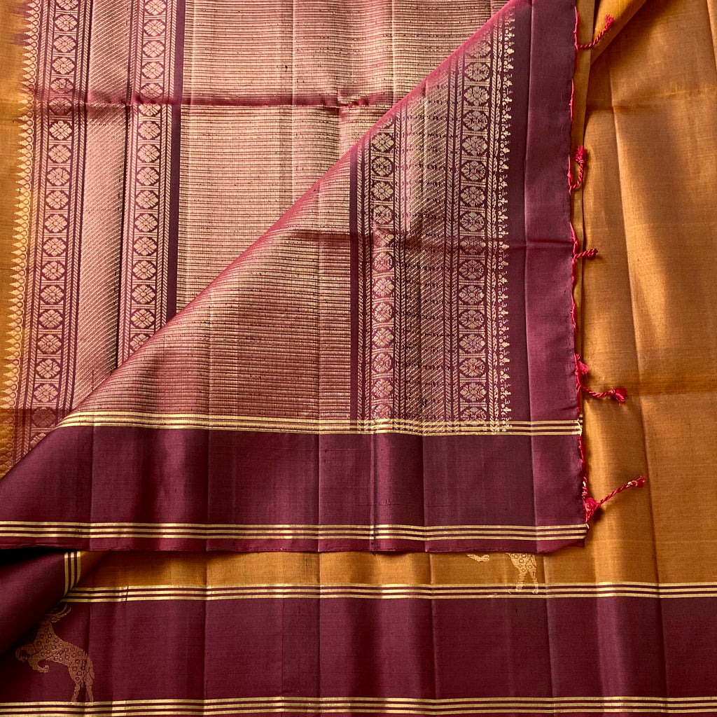 Magical rust with wine, maroon designer pure silk with dear motifs