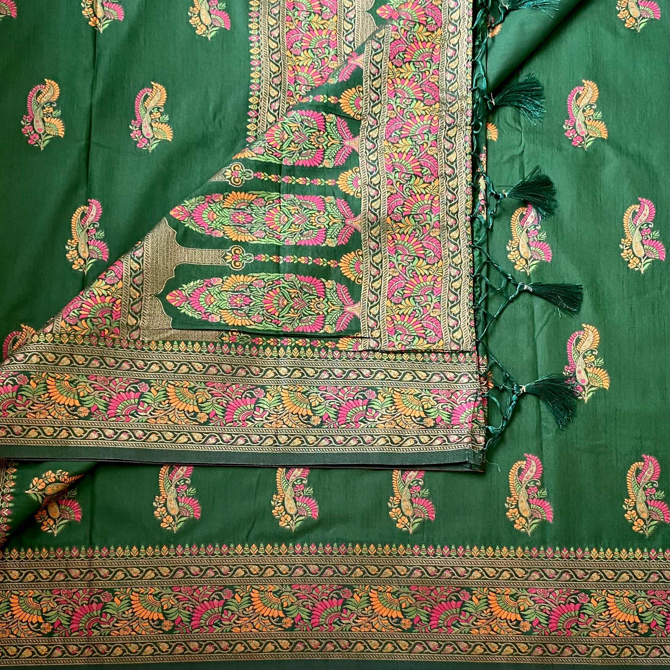 Emerald green with Meenakari woven(not printed) soft tussar with rich pallu