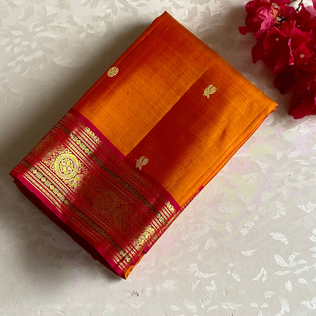 Saffron Orange Kanjeevaram Pure Zari Silk Saree With Rani Pink Pallu