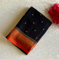 Jet Black Banarasi Crepe Silk Saree With Burnt Orange Pallu