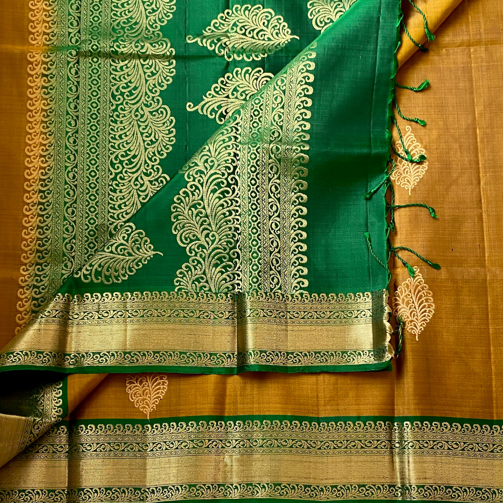 Magical Mustard Brocade Borders on Handloom Designer Pure Silk with stunner Green