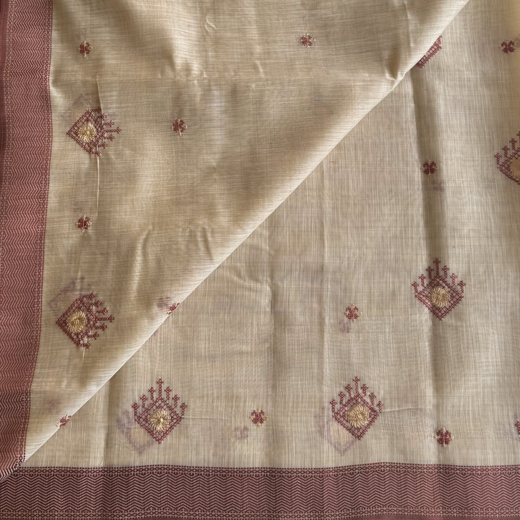 Elegant Pale Beige Saree With Maroon Motifs Gold Zari Border