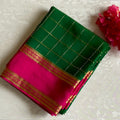 Emerald Green Mysore Crepe Silk Saree With Rani Pink Pallu