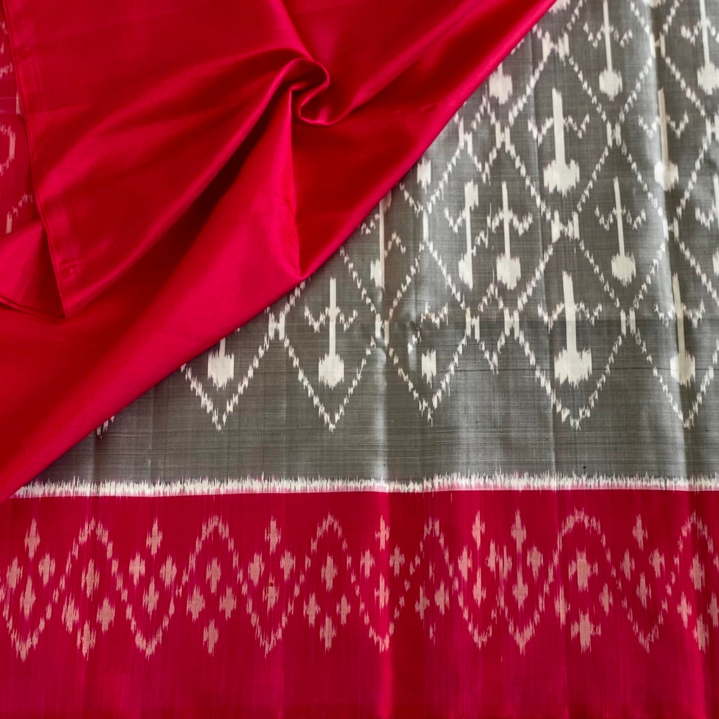 Silver Grey Designer Pure Silk Saree With Rani Pink Ikat Border