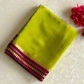 Stunner Green Mysore Crepe Silk Saree With Deep Magenta Pallu And Gold Border