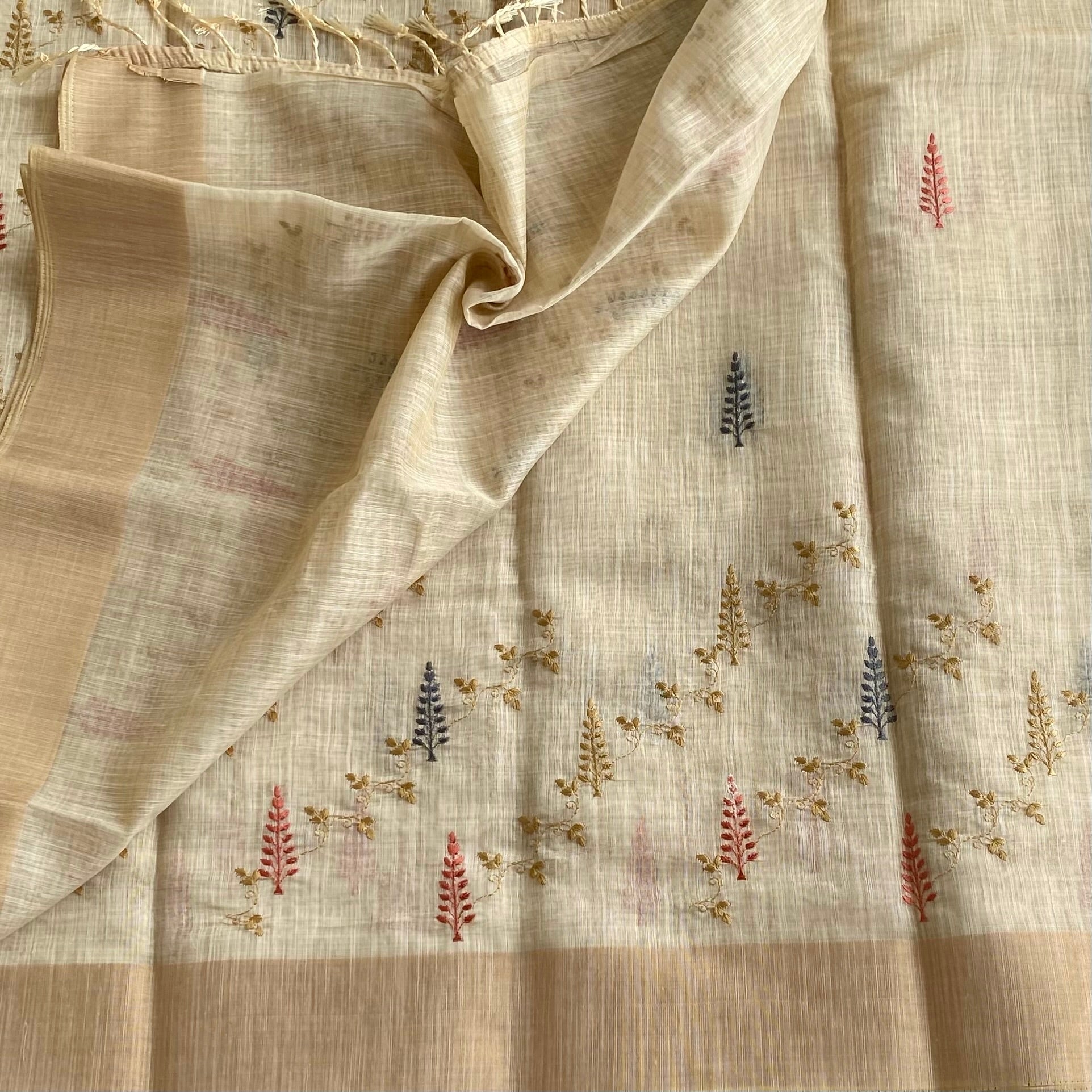 Light Beige Lightweight Tussar Embroidered Motifs With Tan Border Tassels
