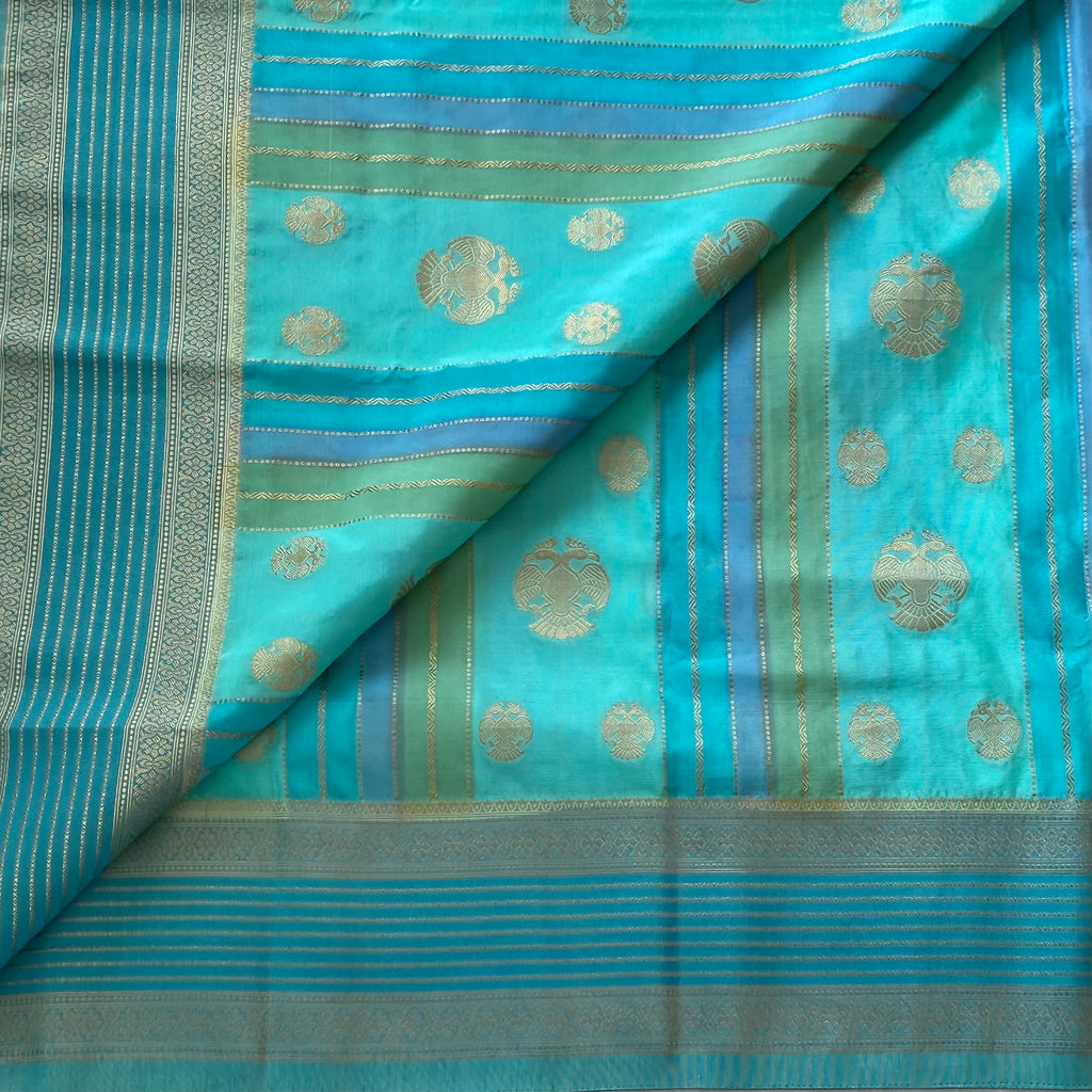 Shades Of Sea Blue On Soft Crepe Silk With Gandaberunda Buttas