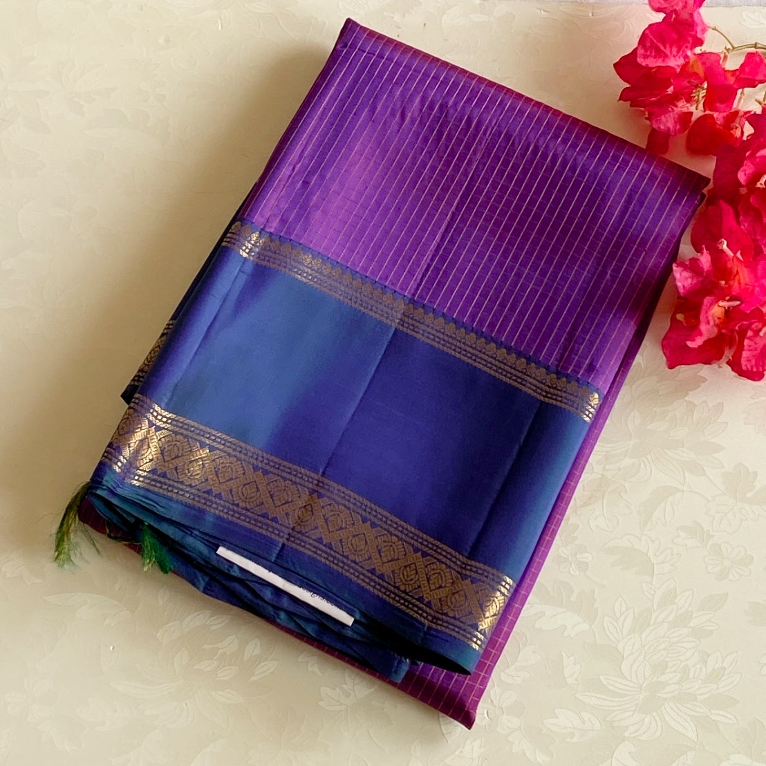 Elegant Violet Magenta Saree with Gold Paisley Border and Tassels