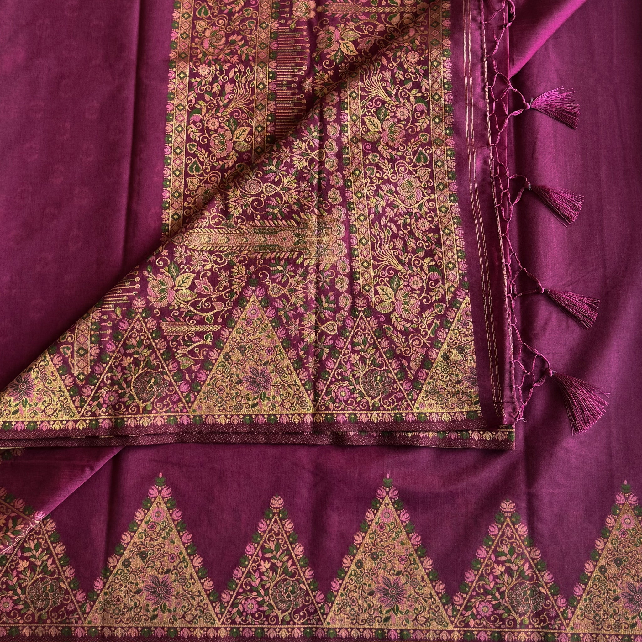 Traditional Magenta Brocade Saree Gold Floral Triangular Border Tassel Pallu