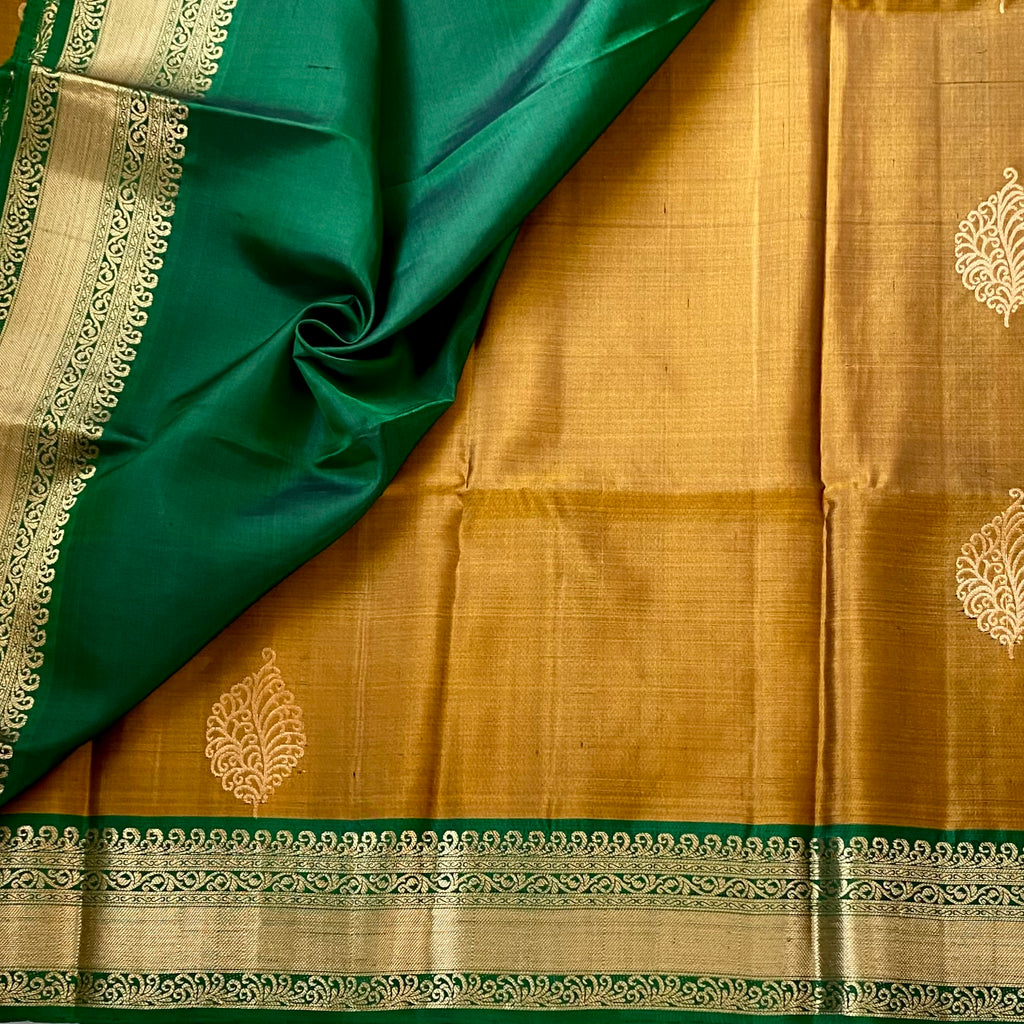 Magical Mustard Brocade Borders on Handloom Designer Pure Silk with stunner Green