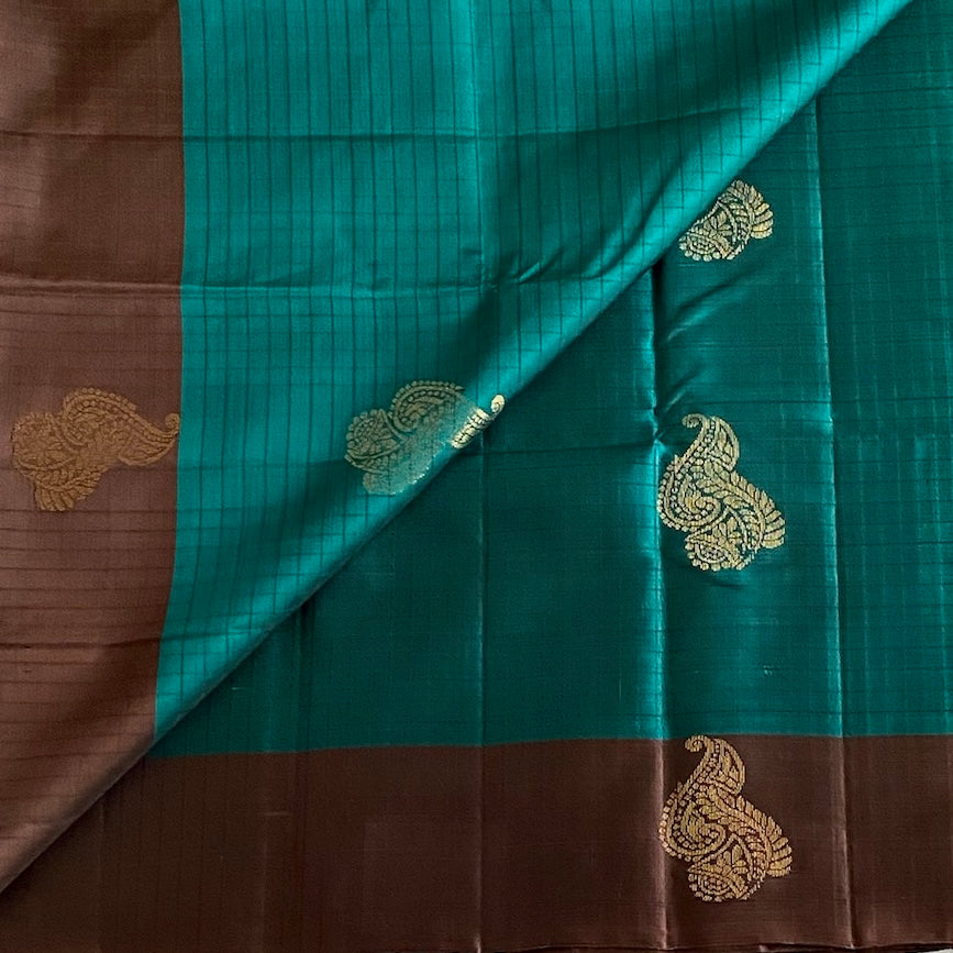 Teal Designer Pure Silk With Chocolate Brown Pallu And Gold Buttas