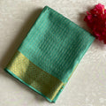 Dreamy Sea Blue Mysore Crepe Silk Saree With Metallic Gold Border