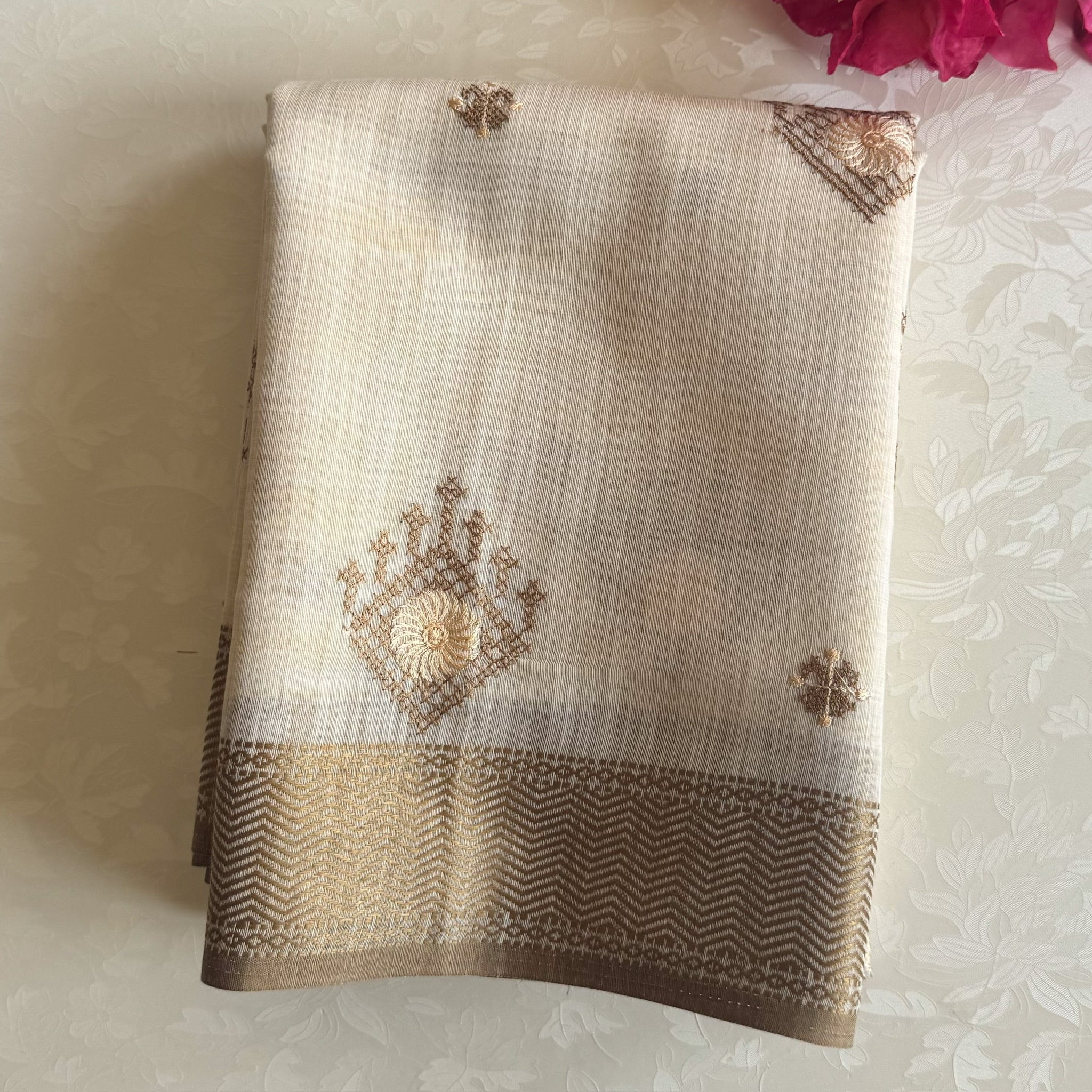 Ivory chestnut geometric handloom saree with woven zigzag border tassels