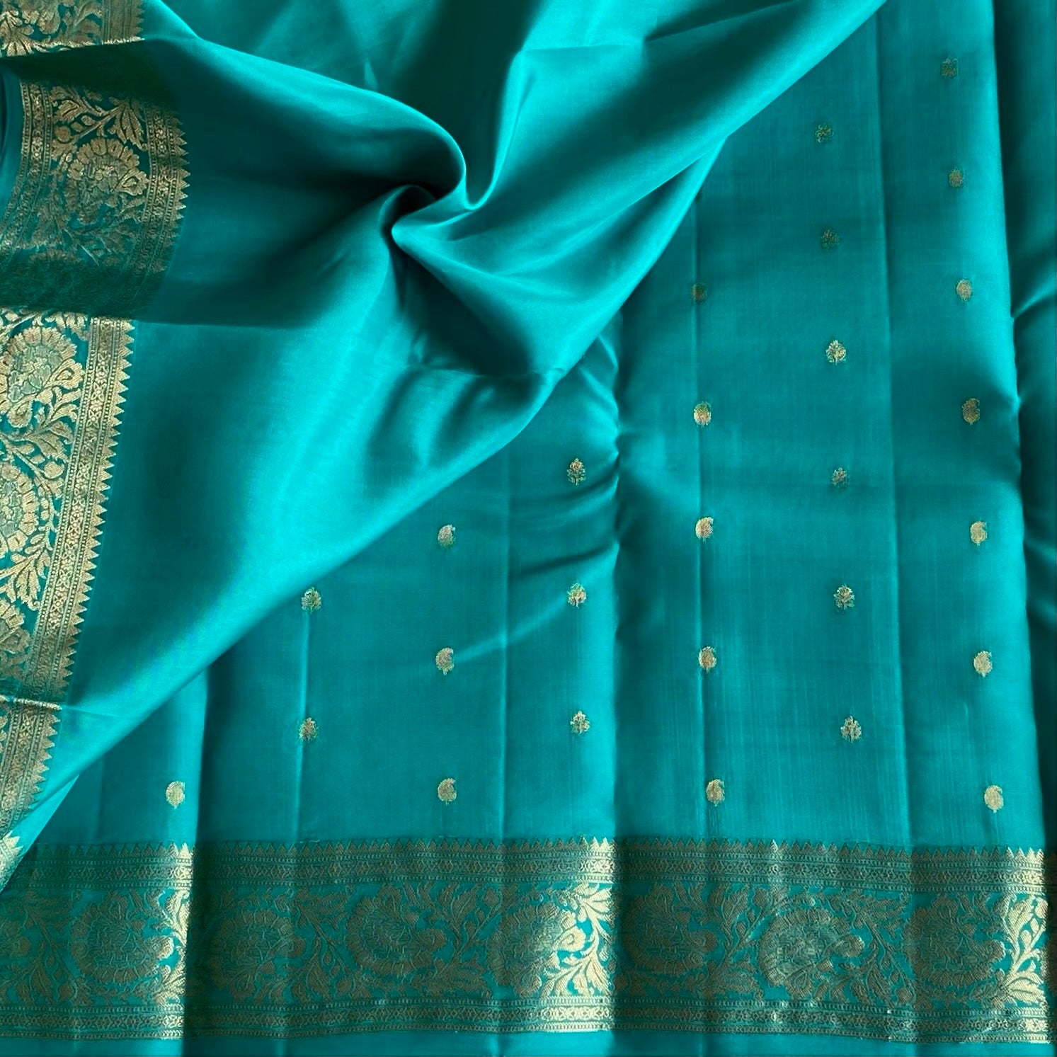 Dreamy Sea Blue And Gold Designer Pure Silk Saree With Floral Zari Border