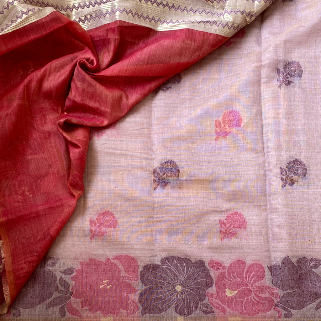 Pastel Mauve Floral Saree With Gold Zari Border And Tassels