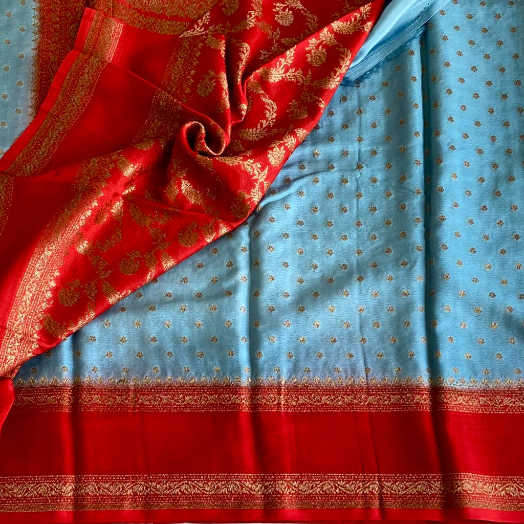 Wonder Sky Blue Banarasi Crepe Silk Saree With Scarlet Red Bordero
