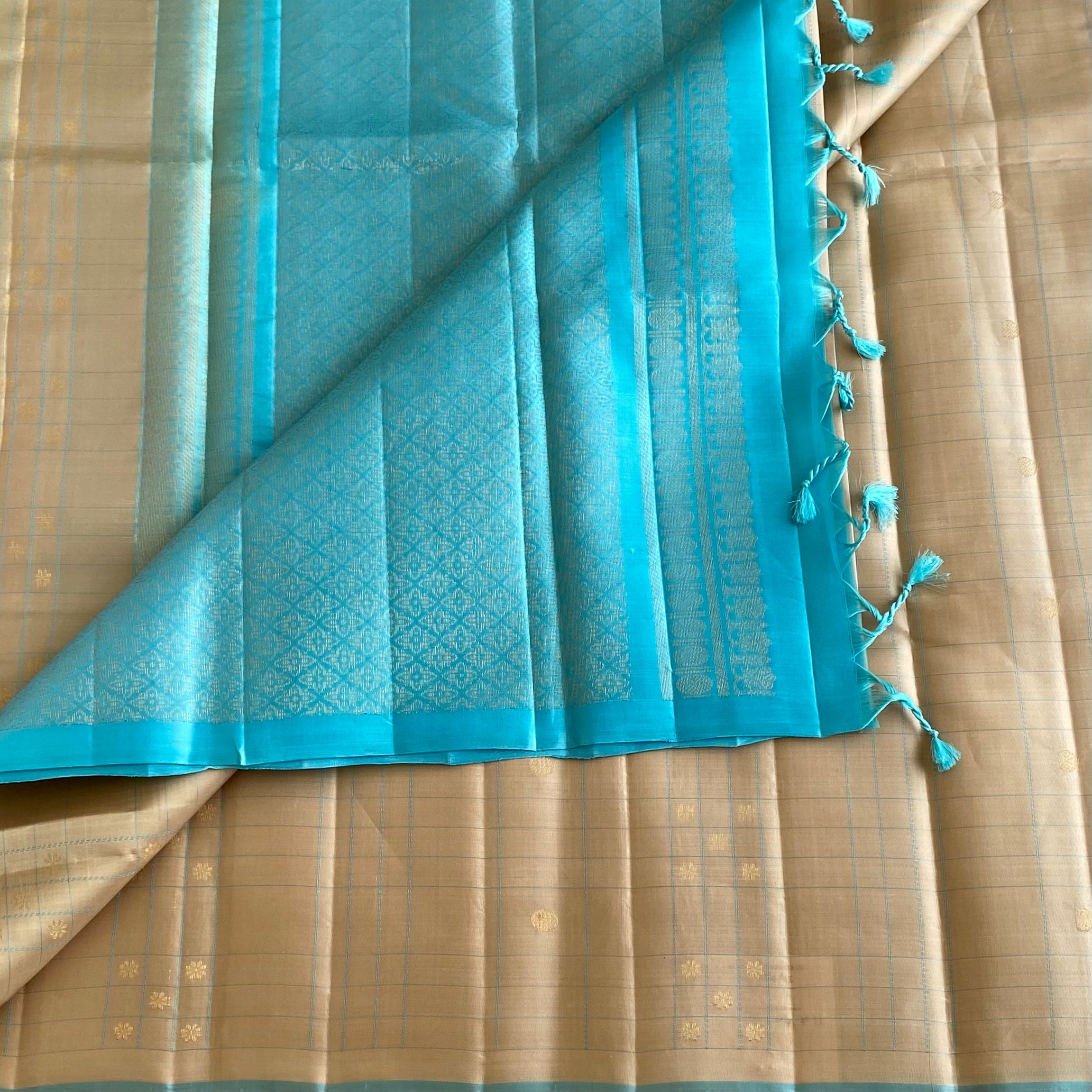 Subtle Gold Designer Pure Silk Saree With Turquoise Pallu And Gold Zari
