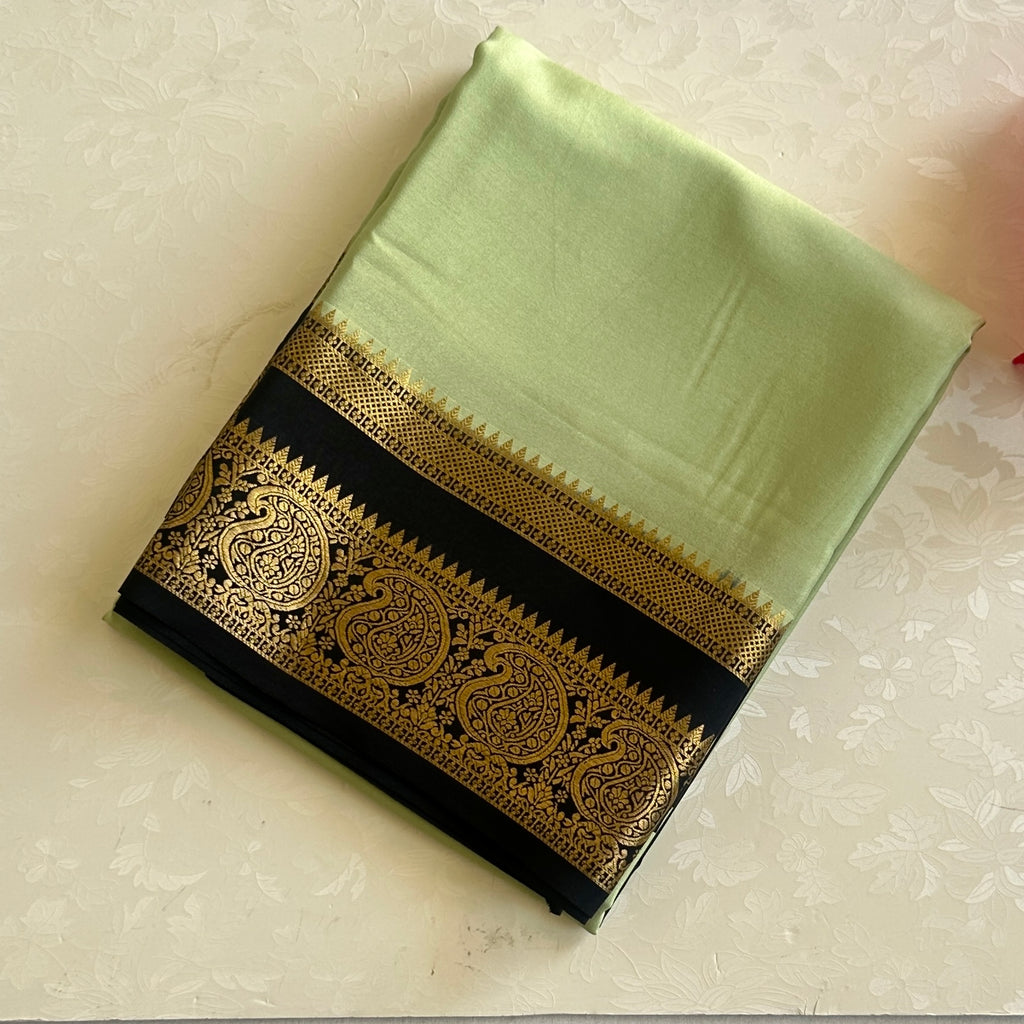 Pistachio Silk Saree with Black Gold Paisley Border for Festivities