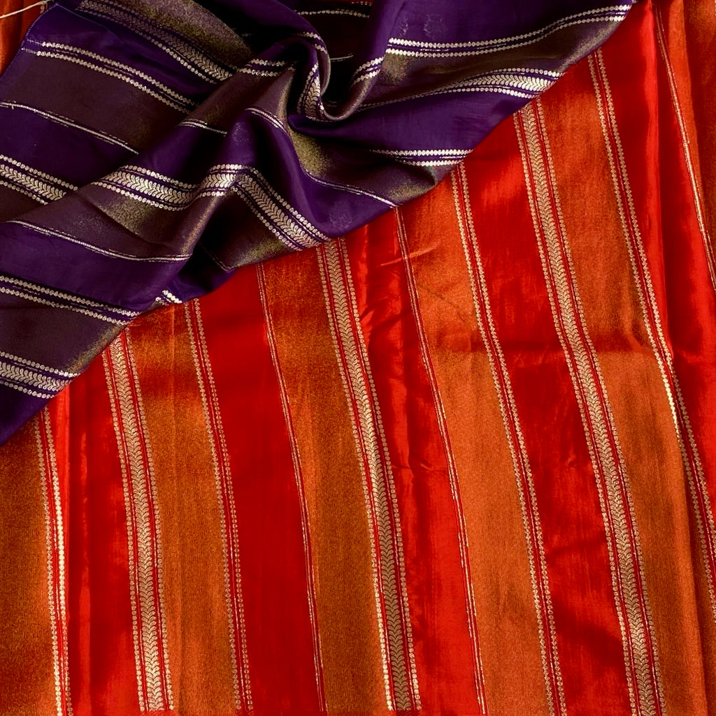 Vermilion Orangish Red Soft Tissue Crepe Saree With Metallic Gold Buttas And Stripes