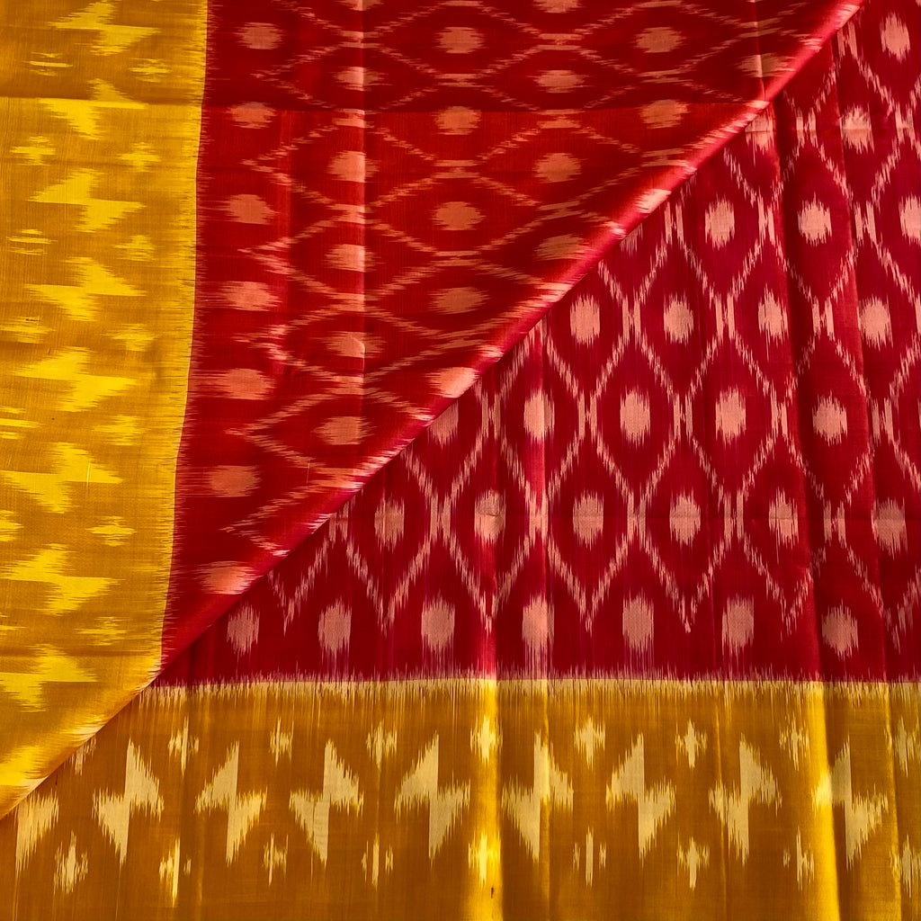 Reddish Pink Designer Pure Ikkat Silk With Saffron Yellow Pallu